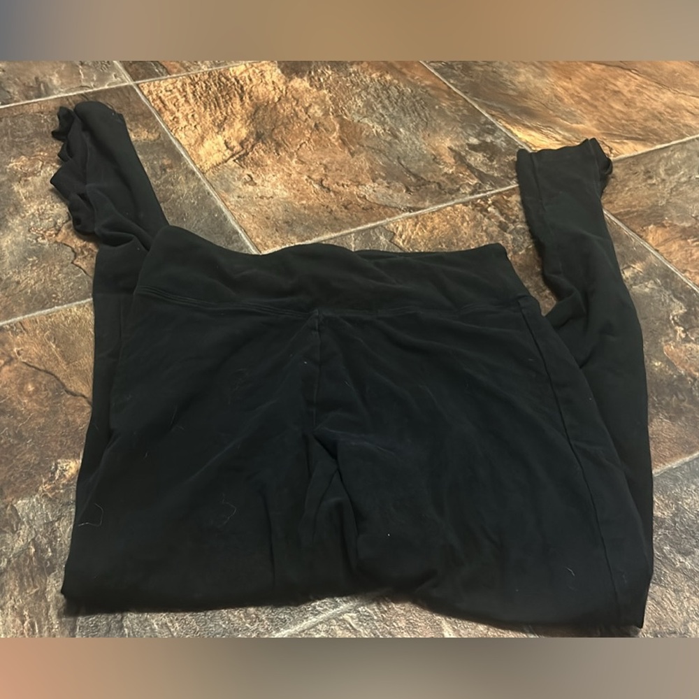 Two pairs of small Victoria’s Secret leggings, black.